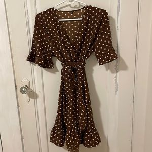 Polkadot dress, with light cream dots, runs small